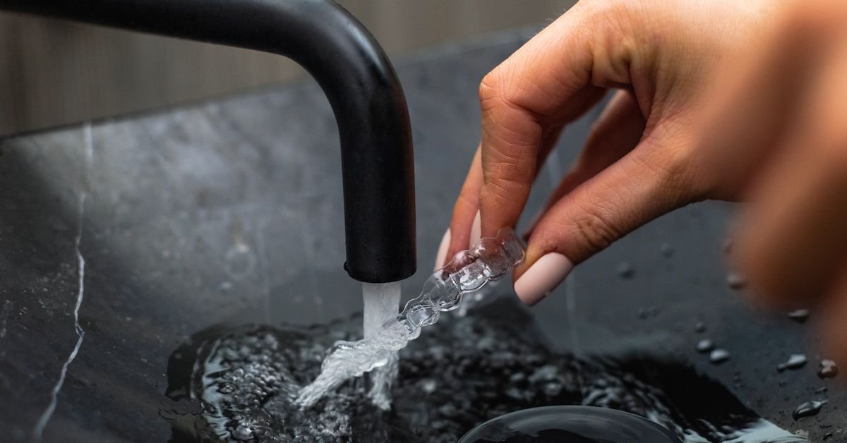 Warm water after every meal to rinse and refresh your aligner