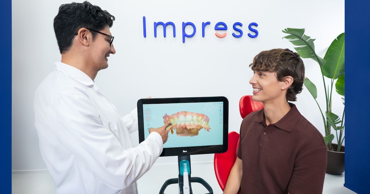 Reviewing a 3d image of teeth in clinic