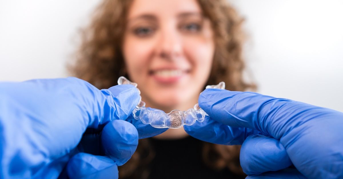 A person trying Invisalign for the first time in the orthodontic clinic